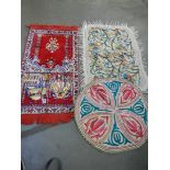 A prayer mat and 2 embroidered felt rugs