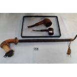 A long vintage pipe & 3 others