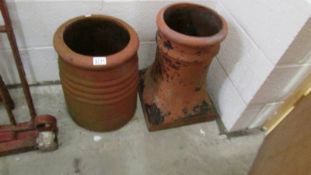 2 clay chimney pots (approximately 47cm tall).