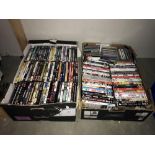 2 boxes of dvd's and cd's