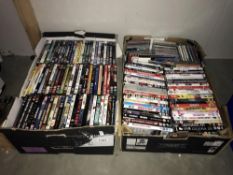 2 boxes of dvd's and cd's