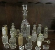 A glass decanter and a mixed lot of cruet bottles etc.