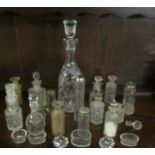 A glass decanter and a mixed lot of cruet bottles etc.