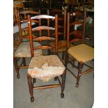 A set of 4 early 20th century oak ladder back chairs.