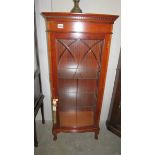 A good quality mahogany display cabinet with cut glass door.
