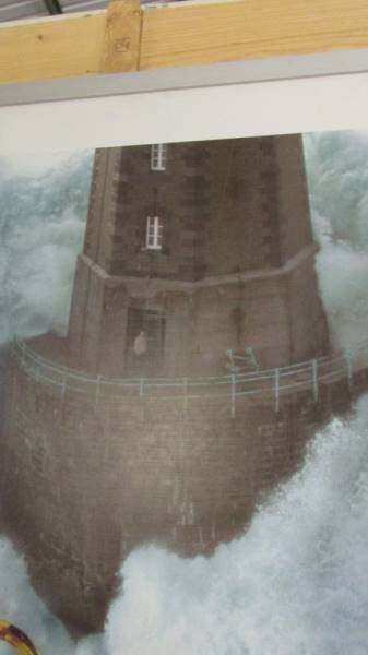 A large framed and glazed print of a lighthouse in rough seas. - Image 2 of 2
