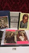 A mixed lot of movie related postcards and ephemera including singed facsimile cards of Gary Cooper,