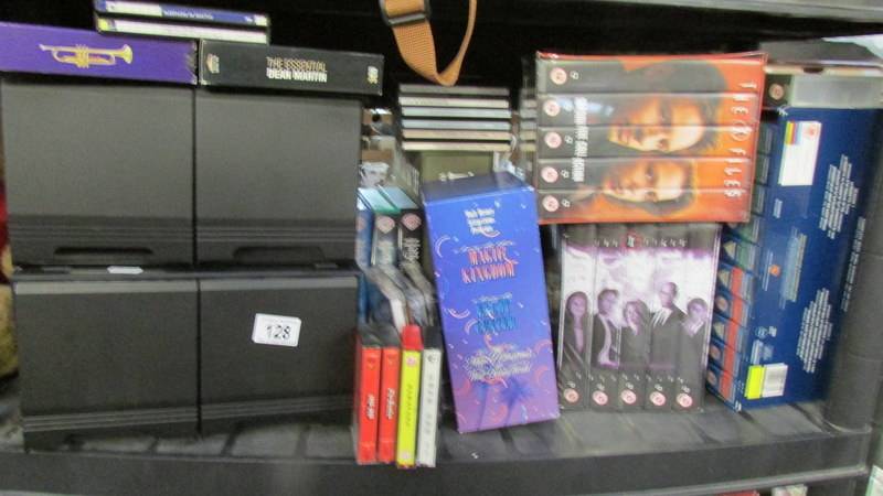 A quantity of DVD's including boxed sets and a quantity of CD's.