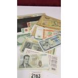 A mixed lot of world bank notes including Belgium, India, Peru etc.