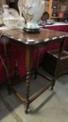 An oak barley twist leg occasional table.