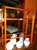 A stained wood towel rail
