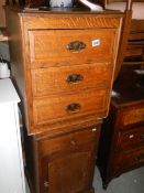 A solid oak 3 drawer chest and a 1930's oak pot cupboard