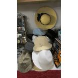 A mixed lot of vintage hats.