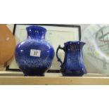 A Lancaster pottery vase and a blue pottery jug.