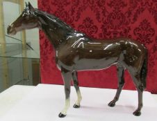 A large Beswick brown horse.