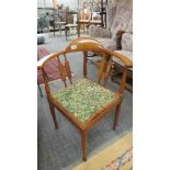 A mahogany inlaid corner chair.