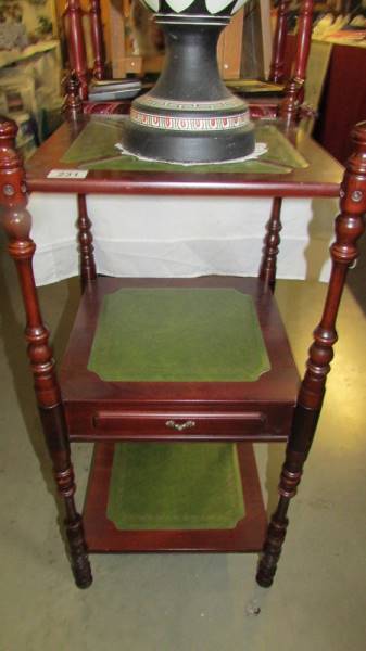 A mahogany 3 tier stand.