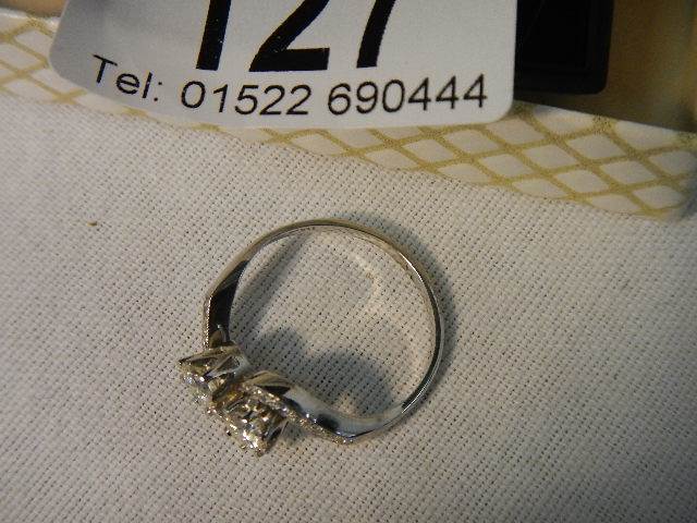 An 18ct white gold crossover diamond ring of 80pts, weight 4.4 grams, size N. - Image 5 of 6