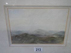 A good framed and glazed watercolour of hills (possibly Wales) signed Lauder, 40 x 34 cm.