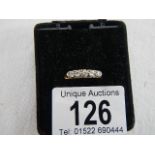 An 18ct vintage yellow gold 5 stone diamond ring, weight 3.3 grams, size O half.