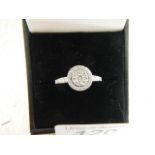 A 9ct white gold ring of separate carats ( half carat in total), weight 2.4 grams, size P.