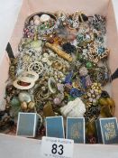 A tray of assorted costume jewellery including bracelets, earrings, Scottish pendant etc.