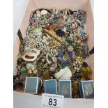 A tray of assorted costume jewellery including bracelets, earrings, Scottish pendant etc.