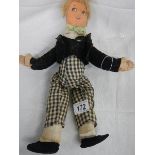 An early 20th century soft toy doll after Norah Wellings, 33 cm.