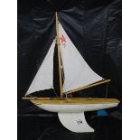 A good old pond yacht, 40 cm long to end of sail, 50 cm tall.