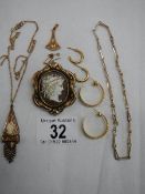 A quantity of gold coloured items including pendant, swivel cameo brooch etc.