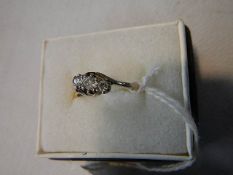 An 18ct gold 3 stone diamond ring, size M.