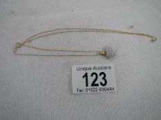 A 9ct gold heart on chain, weight 1.1 grams, length of chain approximately 46 cm.