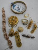 A mixed lot of gold coloured jewellery including 2 rings, early locket, gold coloured bracelet,