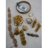 A mixed lot of gold coloured jewellery including 2 rings, early locket, gold coloured bracelet,