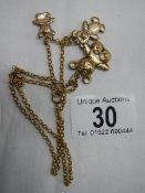 A 9ct gold chain with 3 Teddy bear pendants, 7.8 grams.