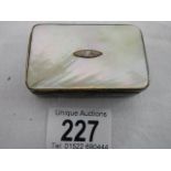A mother of pearl and silver snuff box, not hall marked.
