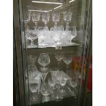 Approximately 26 various cut glass drinking glasses.