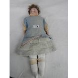 An early 20th century bisque headed doll with moveable joints (1 thumb a/f), model No.