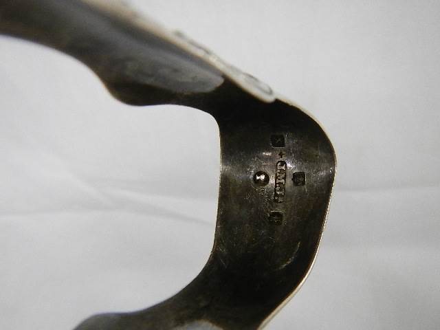 A silver spoon and silver sugar nips. ****Condition report**** Weight approx. - Image 4 of 4