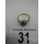 An 18ct white gold ring set diamond chips, size J half.