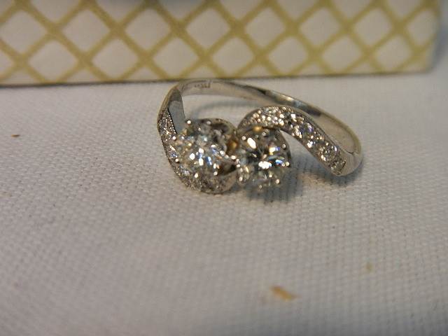 An 18ct white gold crossover diamond ring of 80pts, weight 4.4 grams, size N. - Image 6 of 6