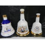 3 Wade Bell's Whisky commemorative bells with content.