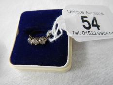 A 9ct gold ring set 3 diamonds, good clarity, size I half.