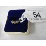 A 9ct gold ring set 3 diamonds, good clarity, size I half.