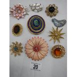 A good lot of ten vintage brooches all in good condition.