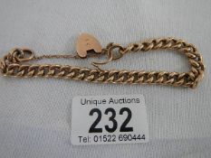 A 9ct gold chain with padlock, 13 grams.