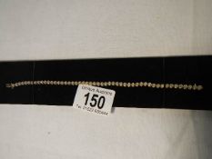 A yellow gold and diamond bracelet, approximately 3 carat.