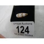 A 9ct 3 stone opal ring (reconstituted opal), weight 3.3 grams, size O half.