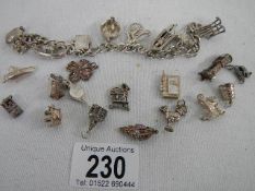 An unmarked charm bracelet with charms.