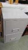 A two drawer filing cabinet, 65.5 cm high, 40 cm wide (no key).